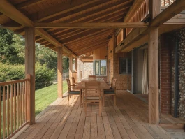 Veranda - structure, boards, sheathing in Douglas Fir with the balustrade in oak Alexander Hills Architects