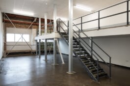 Building 2 ground floor studio with shutters Alexander Hills Architects